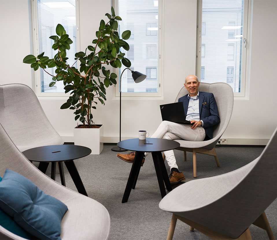 CEO of Alva-yhtiöt sitting at the new premises