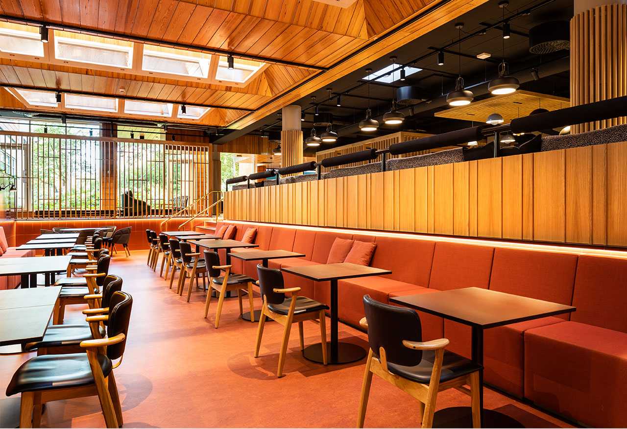 A former swimming pool converted into a dining area at Orion's headquarters