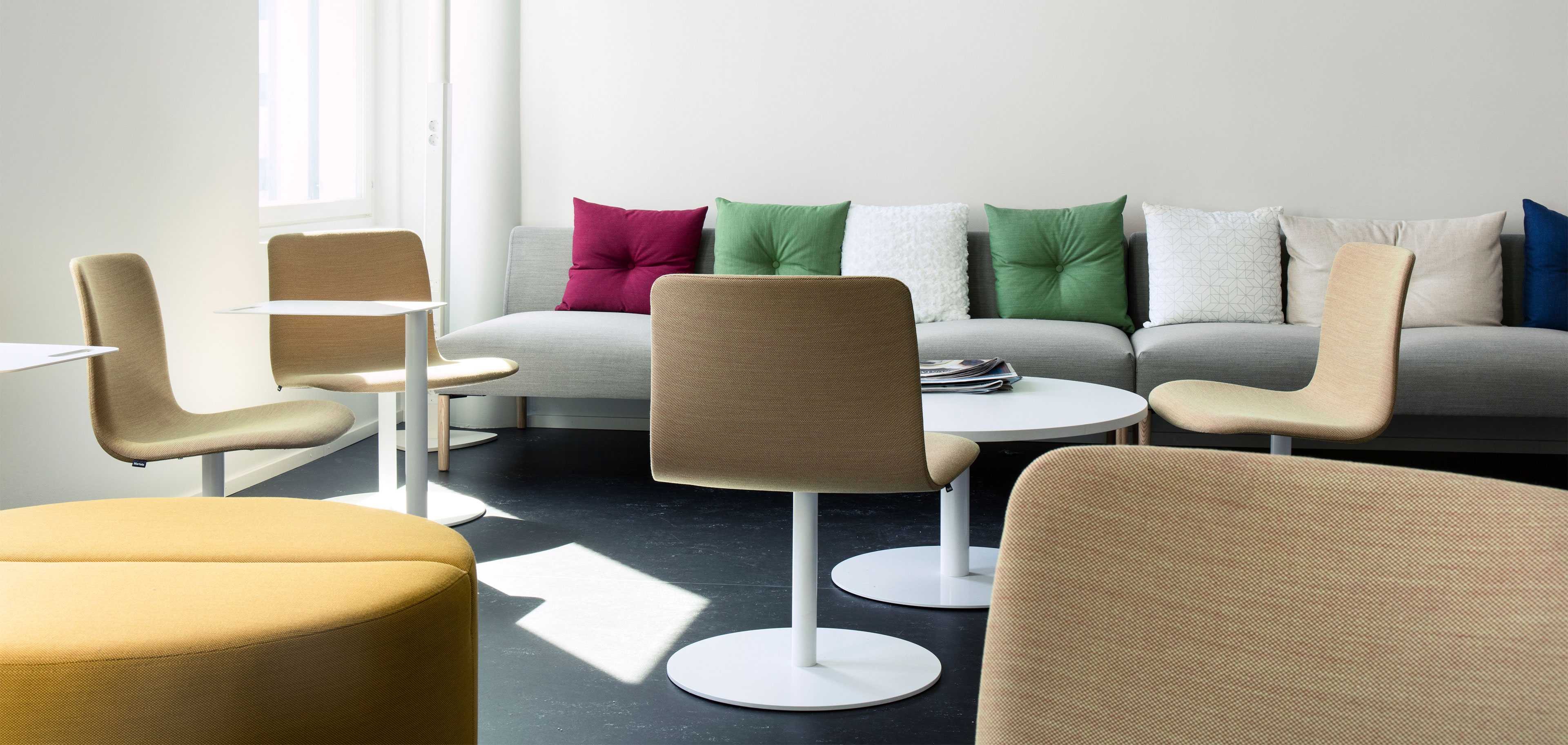 Martela's Sola chairs and Nooa sofa at Solteq's office in Vantaa, Finland