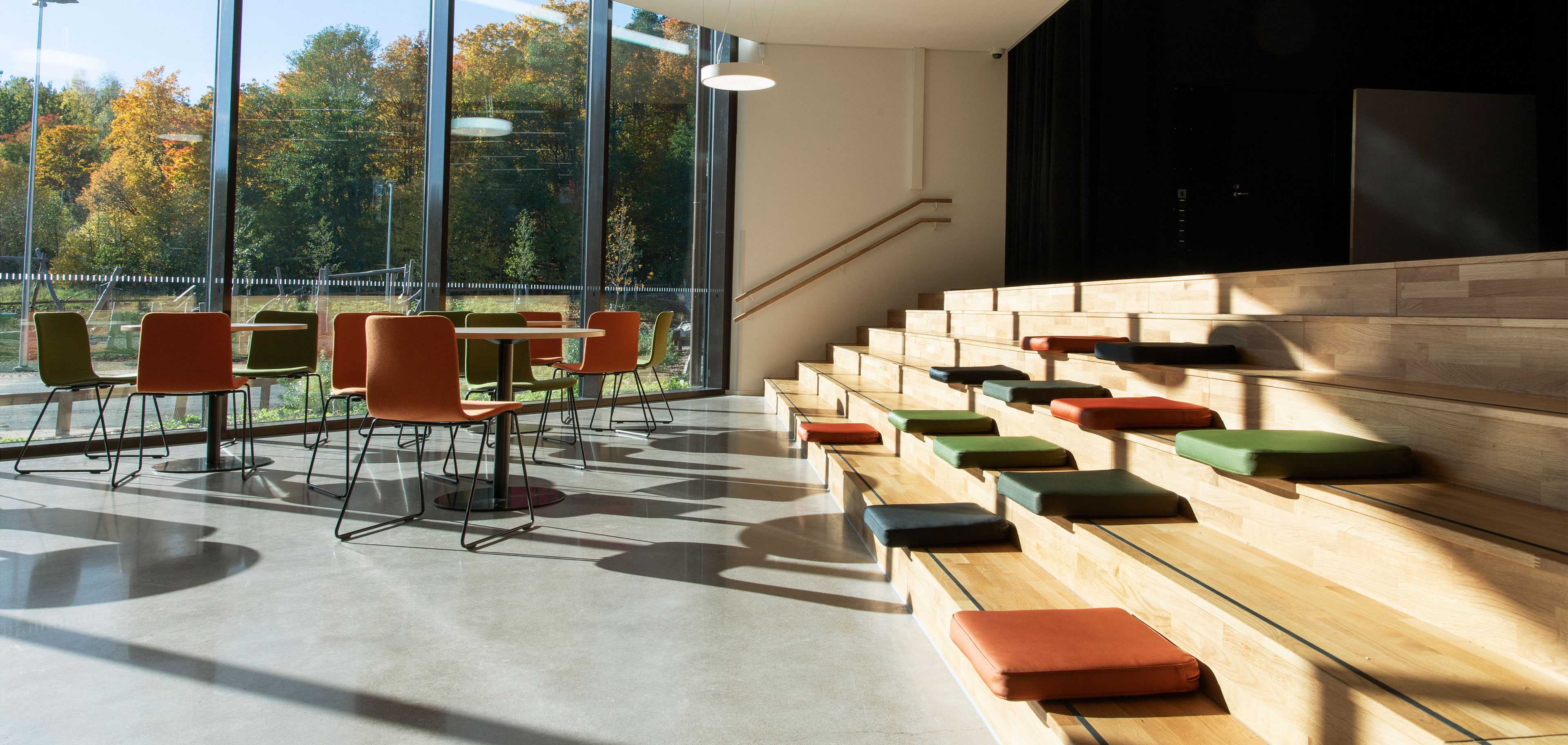 Martela's Sola chairs, Spot tables and Puffet seat cushions at Syvälahti Community Centre in Turku, Finland