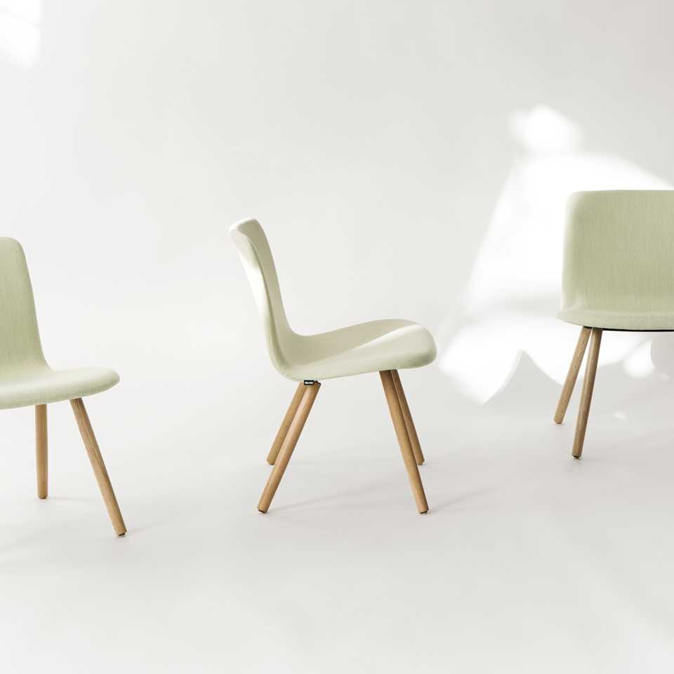 White Sola chairs with wooden legs