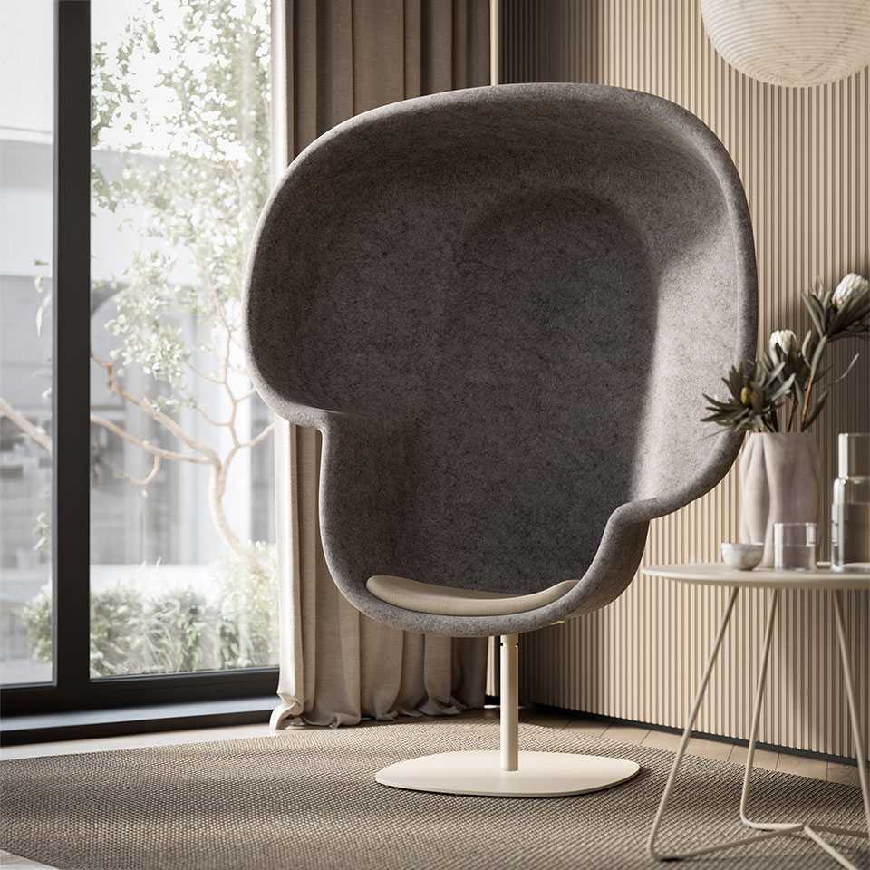 Hubbe armchair next to the Scoop table