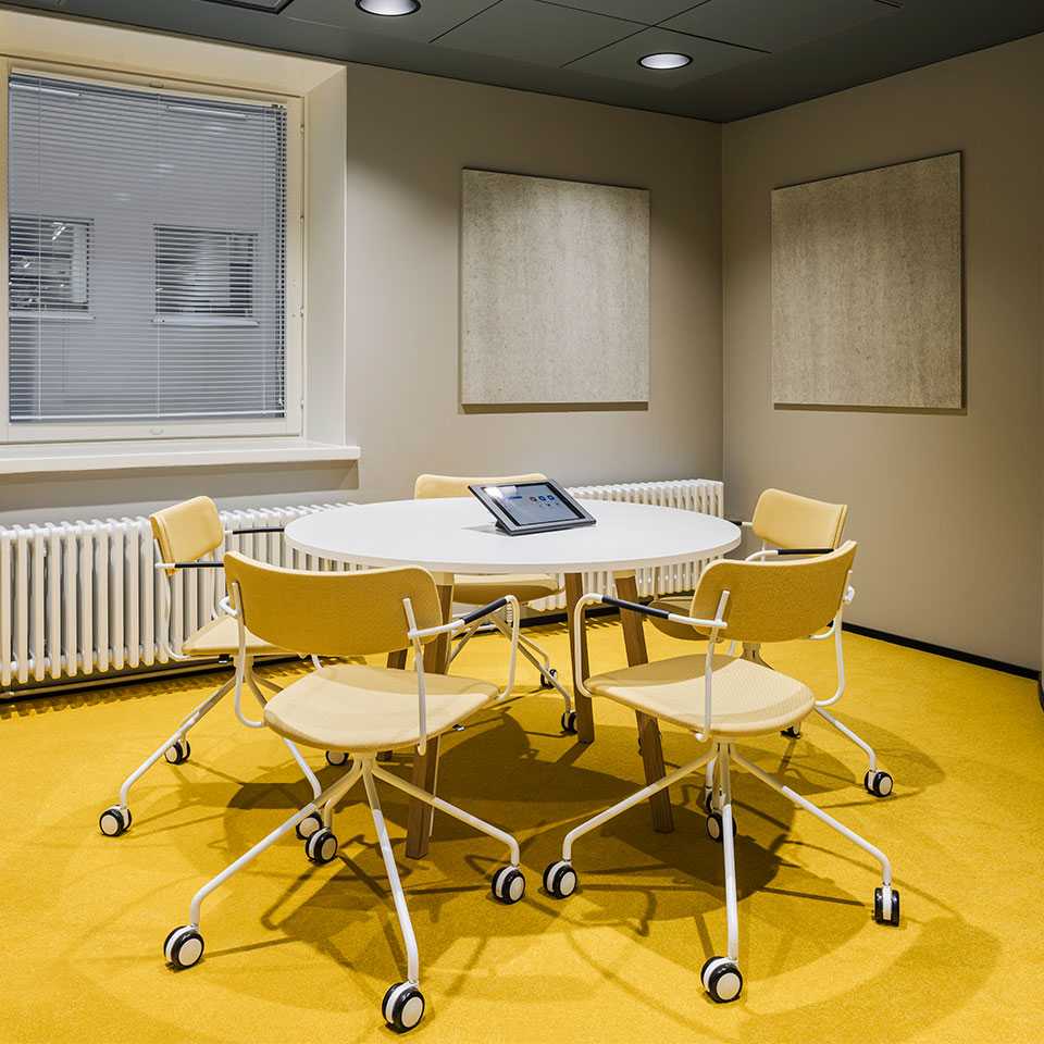 Ella chairs in the yellow conference room